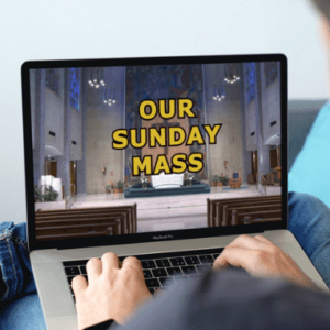 Our Sunday Mass on laptop screen