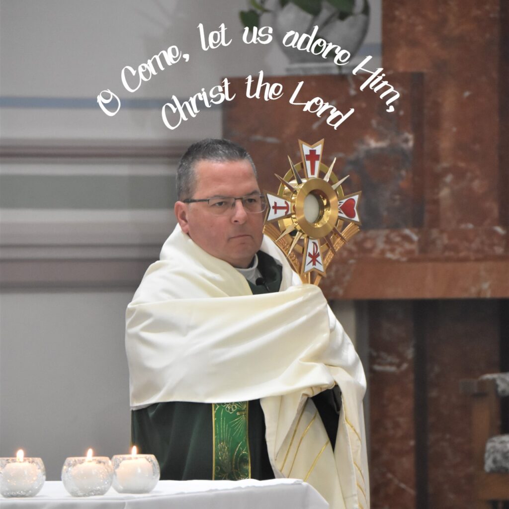 Bishop Bonnar holds a monstrance for reverence, with words "O Come, let us adore Him, Christ the Lord"