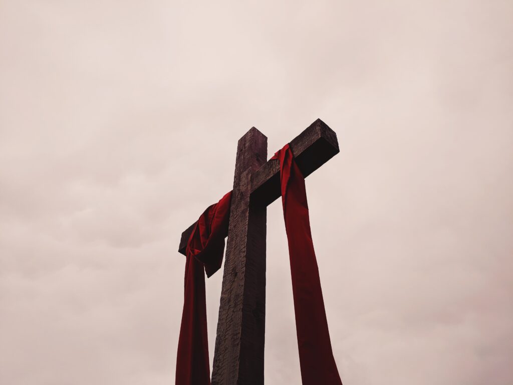 red cloth on cross