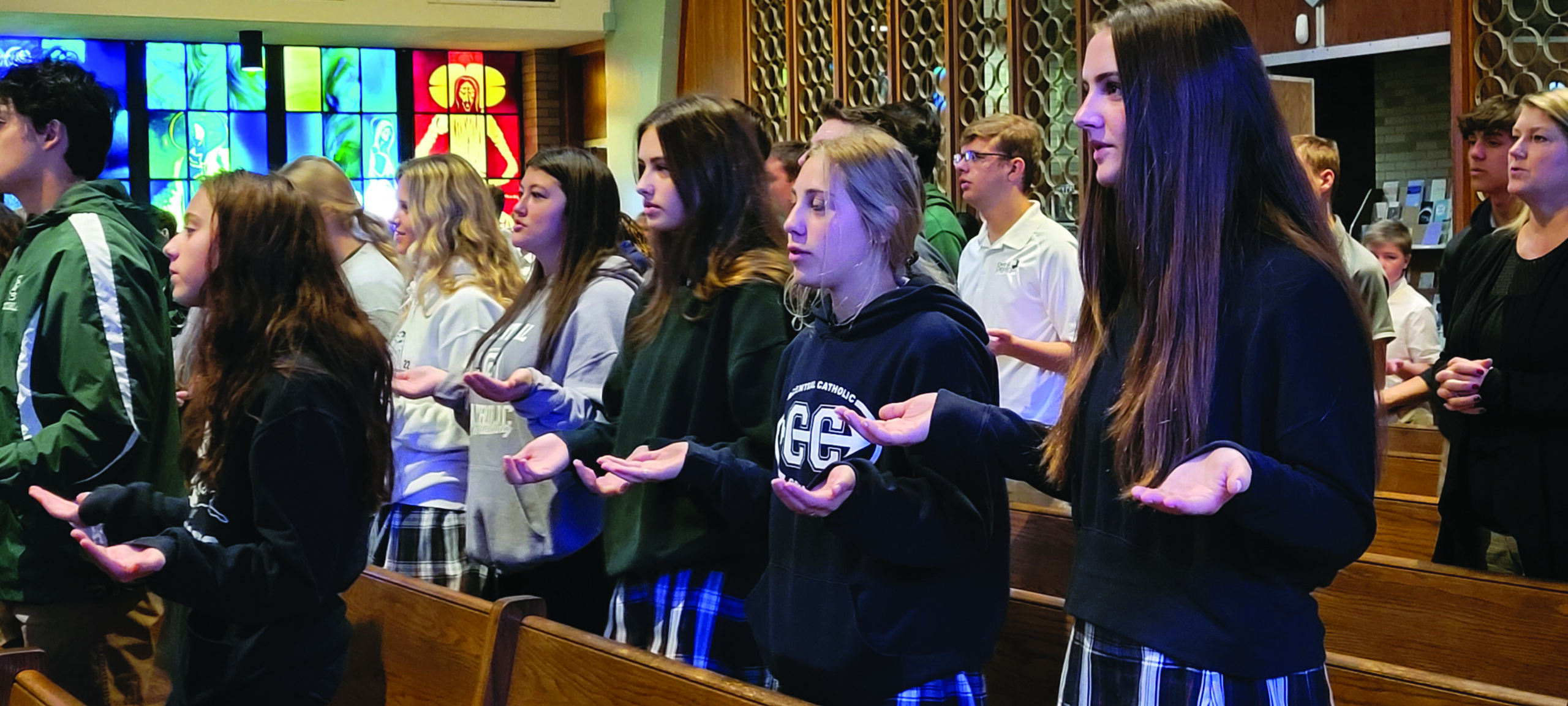 Canton Central High School Students Pray at Mass, hosted at St. Joan of Arc Parish, Canton. Photo submitted by Stark County Catholic Schools.