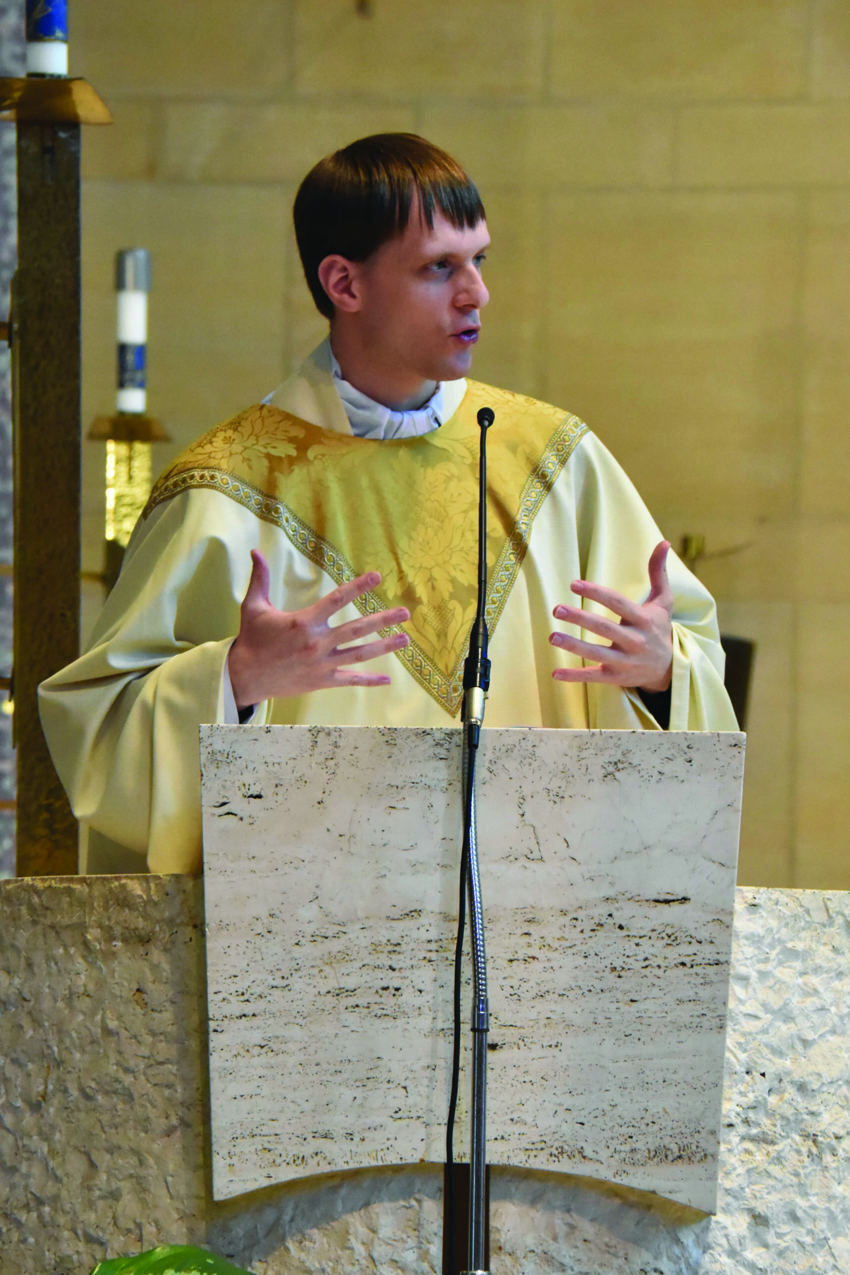 Rev. Matthew Zwilling preaching a homily at St. Columba Cathedral. Photo by Robert Zajack.