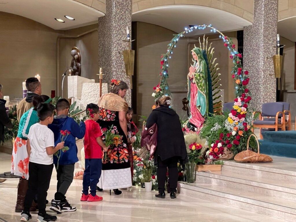 Children waiting to present flowers to Our Lady of Guadalupe at St. Columba Cathedral (Youngstown) on December 12, 2022. Photo credit: Cindee Case.