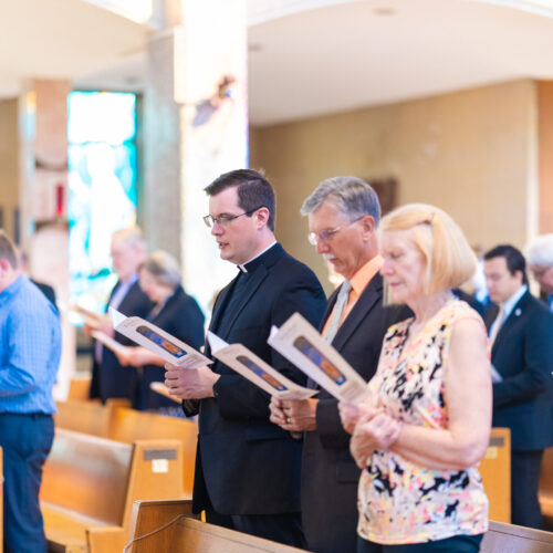 Parishioners singing from pews